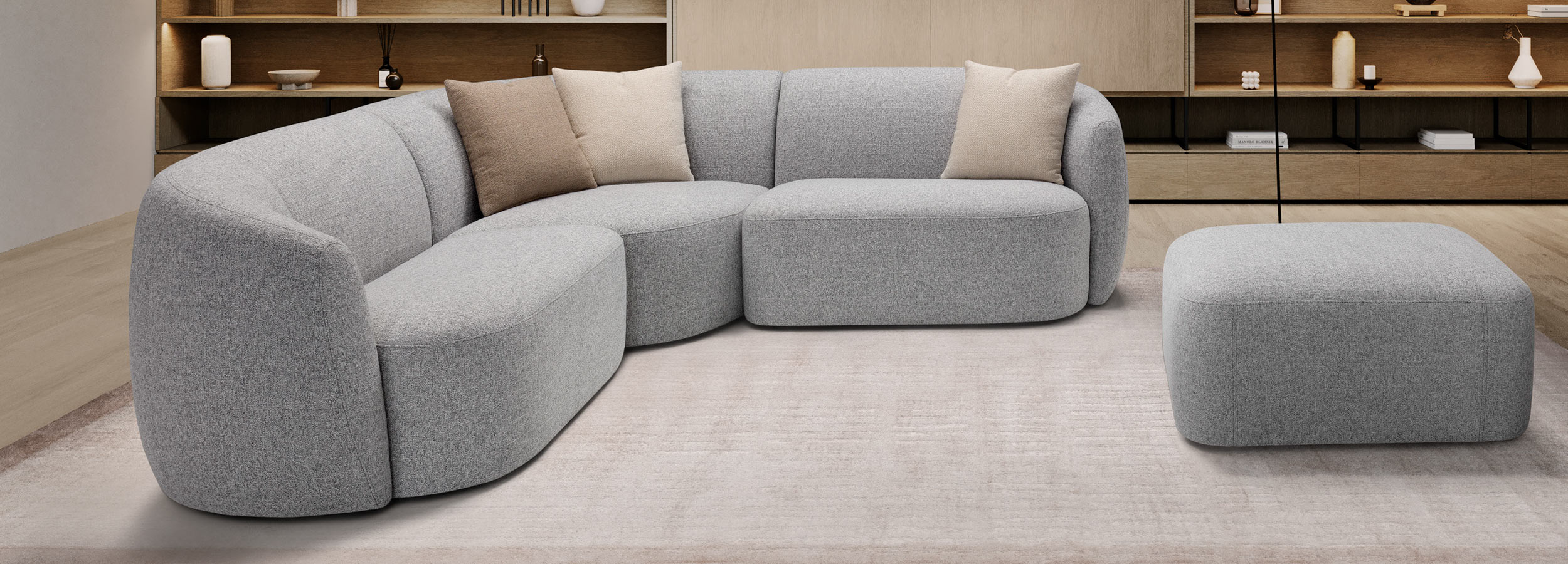 Emotion. A sofa with a strong personality that immediately fills the living area with its rounded, full, hefty yet light lines, like a cloud. A modular solution with soft and deep seats. Comfort at first sight.
